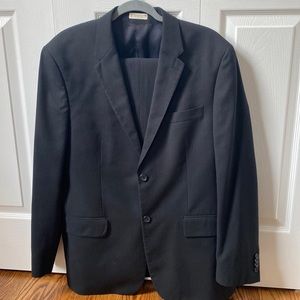 Black Perry Ellis suit, includes jacket 42 SHT and pants 34/30